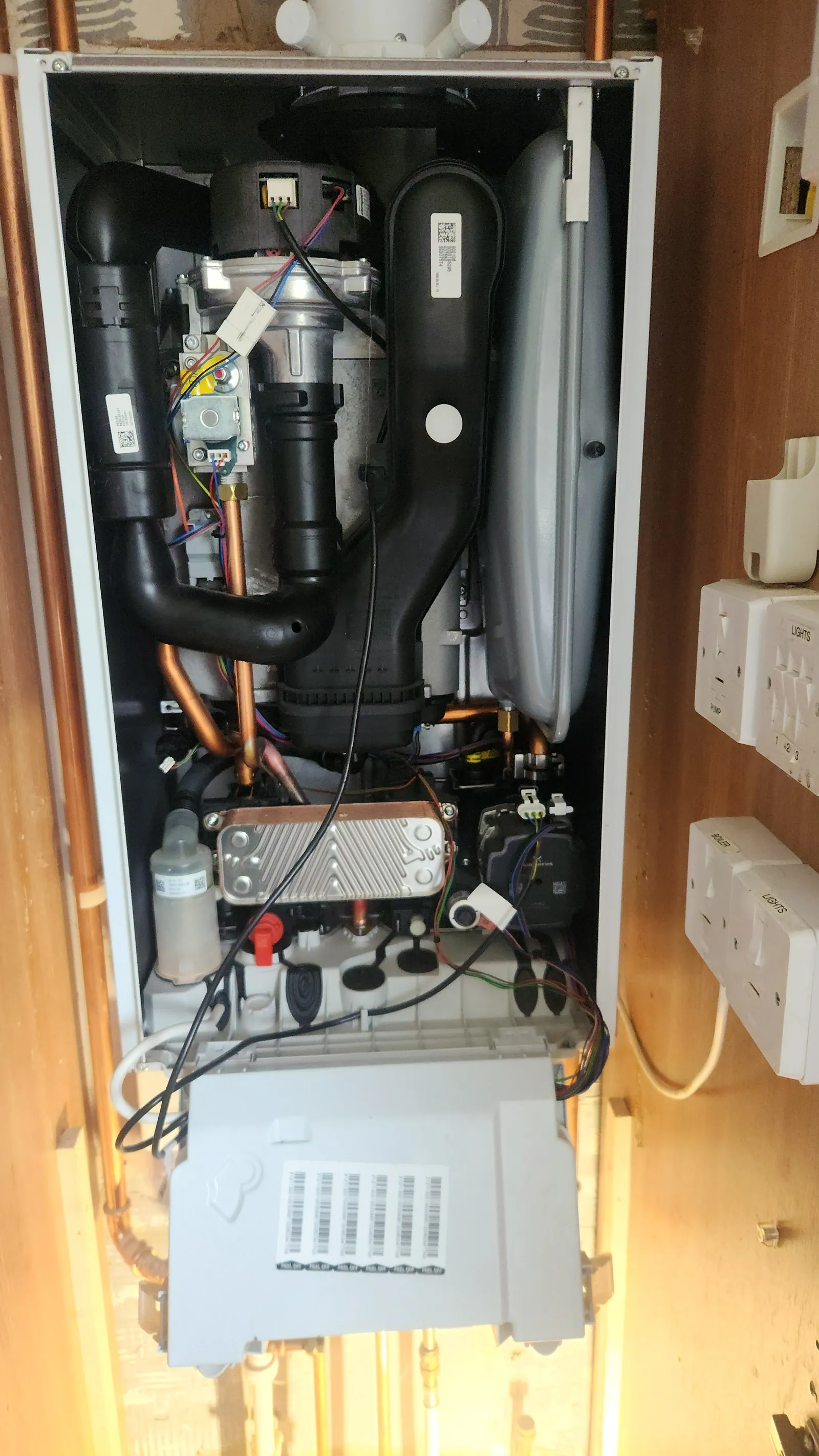 MME engineer servicing a domestic boiler in Bournemouth